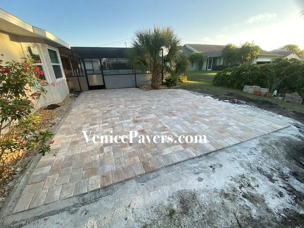 Beachy paver patio addition with custom borders by Venice Pavers