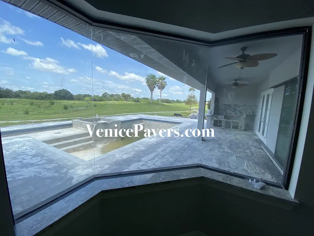 Paver pool deck installation by Venice Pavers